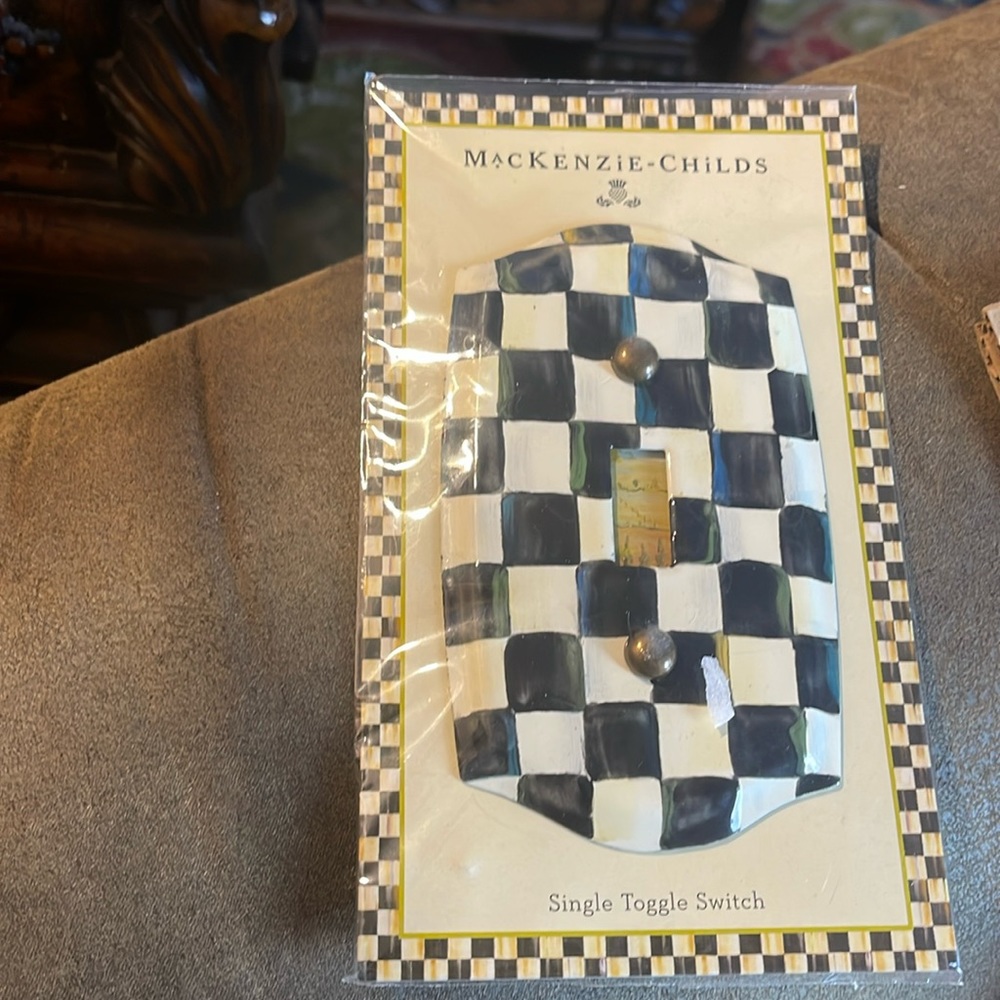 McKenzie Childs single toggle light switch plate in original packaging